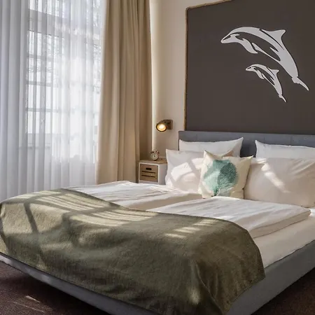 Отель Akzent Strandhotels Seestern, Delphin & Lachs 3*